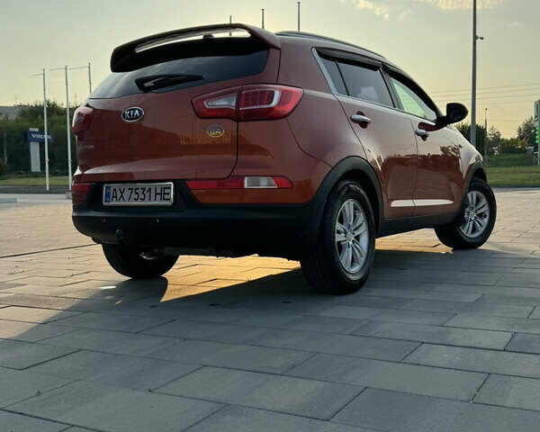 Помаранчевий Кіа Sportage, об'ємом двигуна 2 л та пробігом 152 тис. км за 10300 $, фото 12 на Automoto.ua