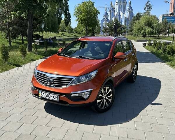 Оранжевый Киа Sportage, объемом двигателя 2 л и пробегом 144 тыс. км за 13950 $, фото 2 на Automoto.ua