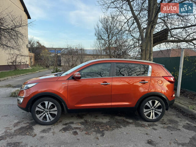 Помаранчевий Кіа Sportage, об'ємом двигуна 2 л та пробігом 101 тис. км за 13300 $, фото 2 на Automoto.ua