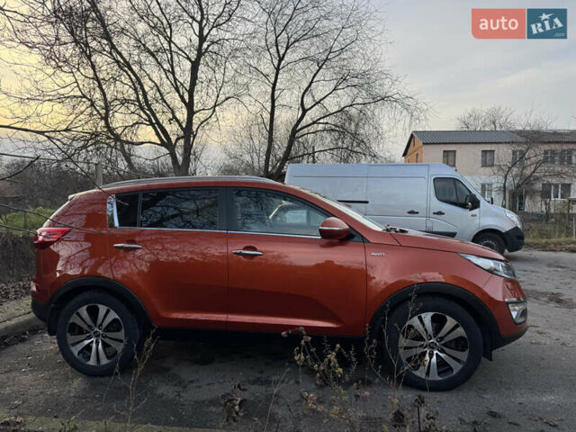 Помаранчевий Кіа Sportage, об'ємом двигуна 2 л та пробігом 101 тис. км за 13300 $, фото 7 на Automoto.ua