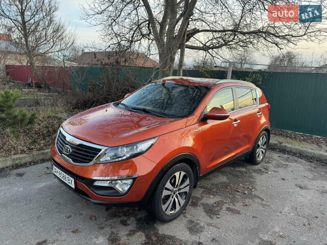 Помаранчевий Кіа Sportage, об'ємом двигуна 2 л та пробігом 101 тис. км за 13300 $, фото 10 на Automoto.ua