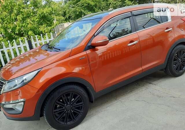 Оранжевый Киа Sportage, объемом двигателя 2 л и пробегом 128 тыс. км за 15700 $, фото 10 на Automoto.ua