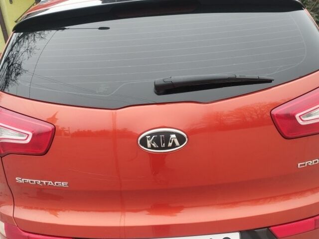 Помаранчевий Кіа Sportage, об'ємом двигуна 2 л та пробігом 240 тис. км за 12600 $, фото 3 на Automoto.ua