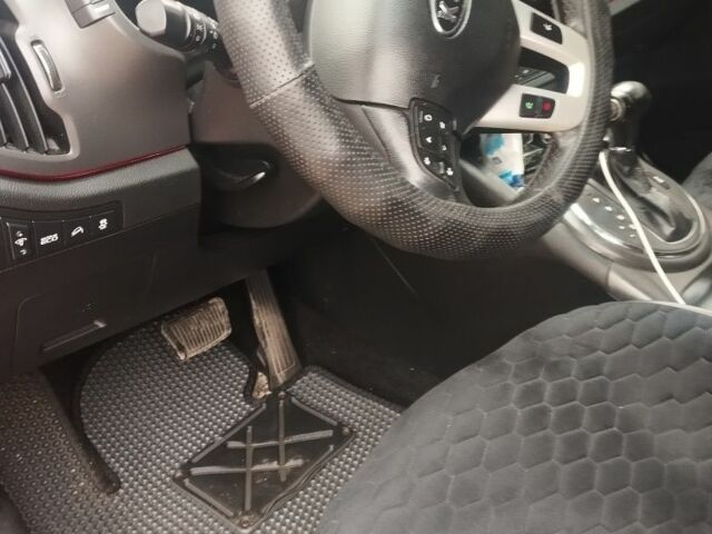 Помаранчевий Кіа Sportage, об'ємом двигуна 2 л та пробігом 240 тис. км за 12600 $, фото 16 на Automoto.ua