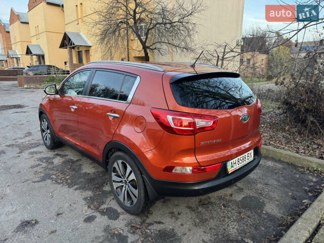 Помаранчевий Кіа Sportage, об'ємом двигуна 2 л та пробігом 101 тис. км за 13300 $, фото 4 на Automoto.ua