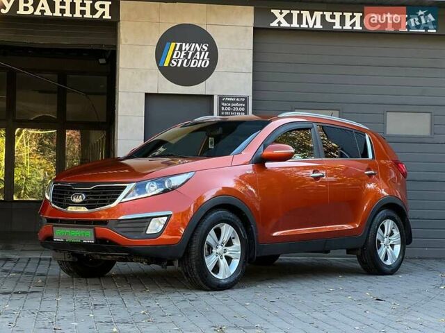 Оранжевый Киа Sportage, объемом двигателя 2 л и пробегом 190 тыс. км за 11900 $, фото 1 на Automoto.ua