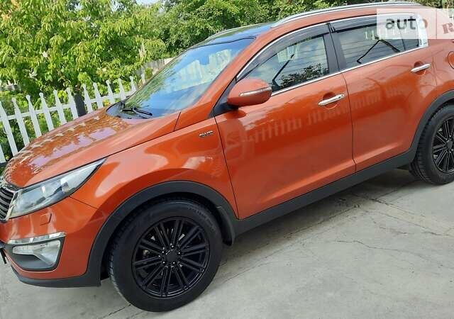 Помаранчевий Кіа Sportage, об'ємом двигуна 2 л та пробігом 128 тис. км за 15700 $, фото 11 на Automoto.ua