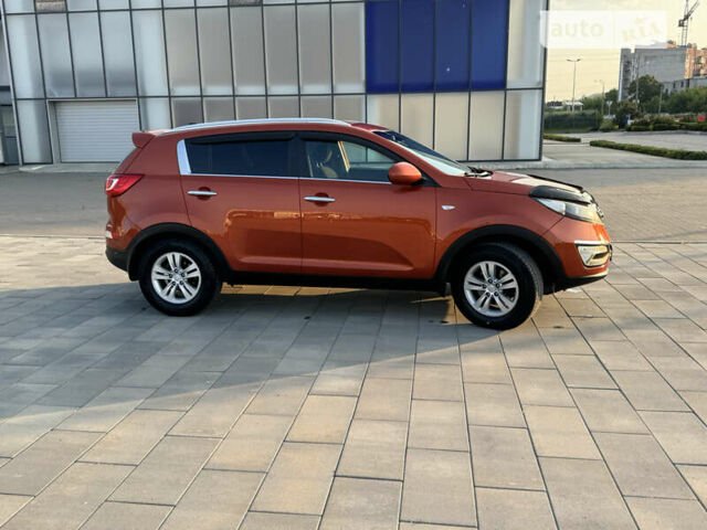 Помаранчевий Кіа Sportage, об'ємом двигуна 2 л та пробігом 152 тис. км за 10300 $, фото 15 на Automoto.ua