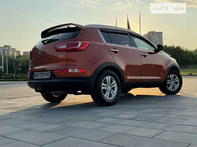 Помаранчевий Кіа Sportage, об'ємом двигуна 2 л та пробігом 152 тис. км за 10300 $, фото 14 на Automoto.ua