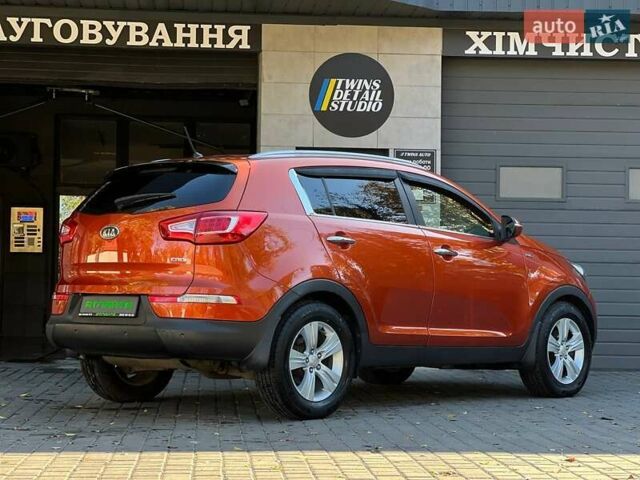 Оранжевый Киа Sportage, объемом двигателя 2 л и пробегом 190 тыс. км за 11900 $, фото 6 на Automoto.ua