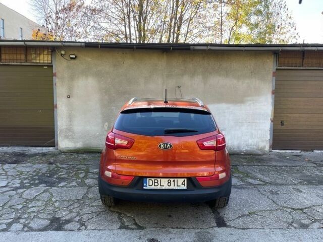 Оранжевый Киа Sportage, объемом двигателя 2 л и пробегом 150 тыс. км за 7900 $, фото 2 на Automoto.ua