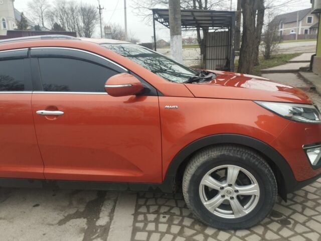 Помаранчевий Кіа Sportage, об'ємом двигуна 2 л та пробігом 240 тис. км за 12600 $, фото 11 на Automoto.ua