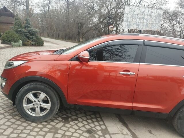 Помаранчевий Кіа Sportage, об'ємом двигуна 2 л та пробігом 240 тис. км за 12600 $, фото 14 на Automoto.ua
