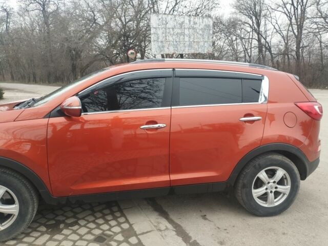 Помаранчевий Кіа Sportage, об'ємом двигуна 2 л та пробігом 240 тис. км за 12600 $, фото 17 на Automoto.ua