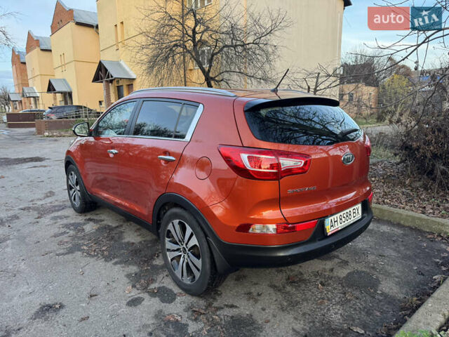 Помаранчевий Кіа Sportage, об'ємом двигуна 2 л та пробігом 101 тис. км за 13300 $, фото 3 на Automoto.ua