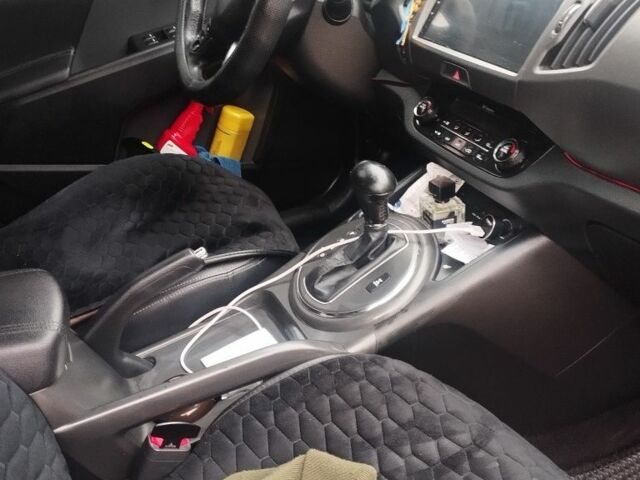 Помаранчевий Кіа Sportage, об'ємом двигуна 2 л та пробігом 240 тис. км за 12600 $, фото 7 на Automoto.ua