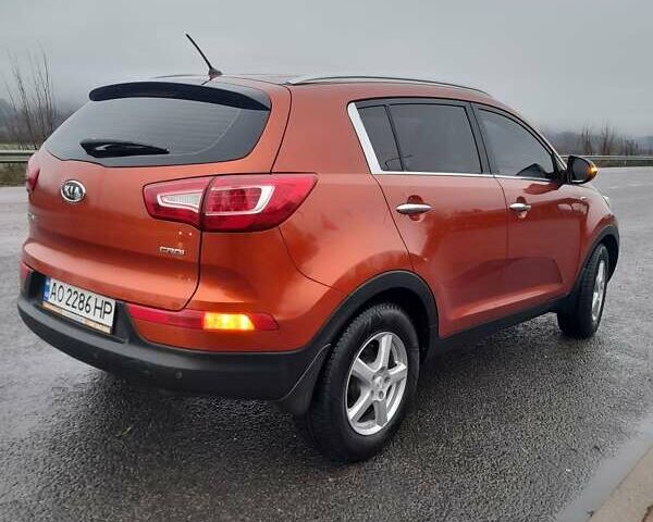 Помаранчевий Кіа Sportage, об'ємом двигуна 2 л та пробігом 218 тис. км за 12700 $, фото 13 на Automoto.ua