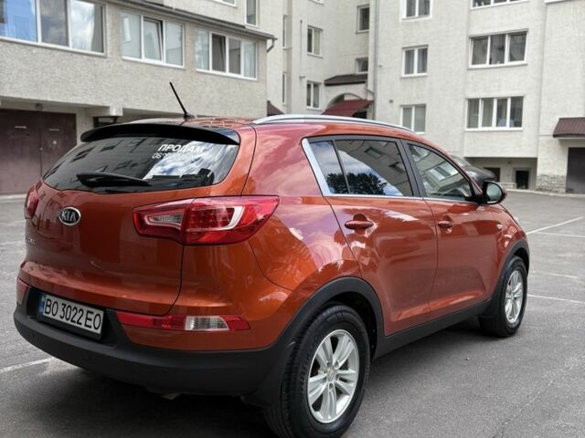 Оранжевый Киа Sportage, объемом двигателя 2 л и пробегом 197 тыс. км за 12000 $, фото 3 на Automoto.ua
