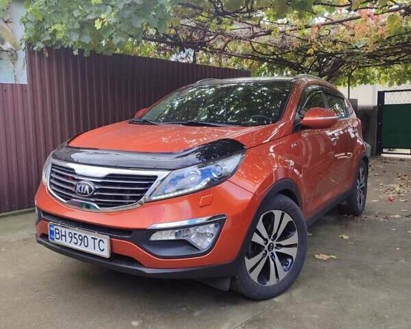 Оранжевый Киа Sportage, объемом двигателя 2 л и пробегом 169 тыс. км за 15500 $, фото 1 на Automoto.ua
