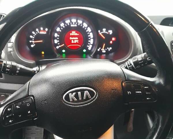 Помаранчевий Кіа Sportage, об'ємом двигуна 2 л та пробігом 218 тис. км за 12700 $, фото 5 на Automoto.ua