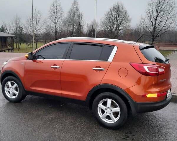 Помаранчевий Кіа Sportage, об'ємом двигуна 2 л та пробігом 218 тис. км за 12700 $, фото 16 на Automoto.ua