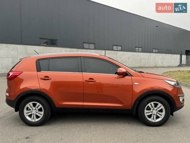 Оранжевый Киа Sportage, объемом двигателя 2 л и пробегом 143 тыс. км за 12300 $, фото 4 на Automoto.ua