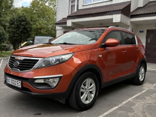 Оранжевый Киа Sportage, объемом двигателя 2 л и пробегом 197 тыс. км за 12000 $, фото 2 на Automoto.ua