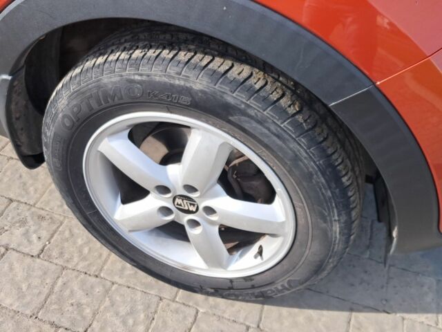 Оранжевый Киа Sportage, объемом двигателя 2 л и пробегом 217 тыс. км за 11500 $, фото 11 на Automoto.ua