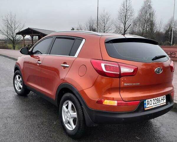 Помаранчевий Кіа Sportage, об'ємом двигуна 2 л та пробігом 218 тис. км за 12700 $, фото 18 на Automoto.ua