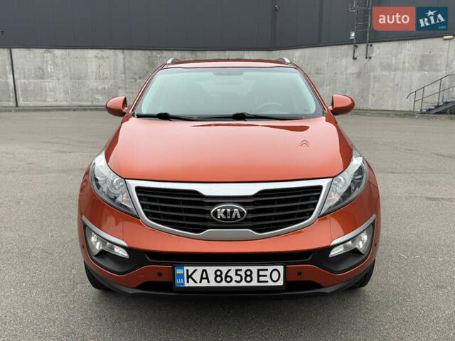 Оранжевый Киа Sportage, объемом двигателя 2 л и пробегом 143 тыс. км за 12300 $, фото 1 на Automoto.ua