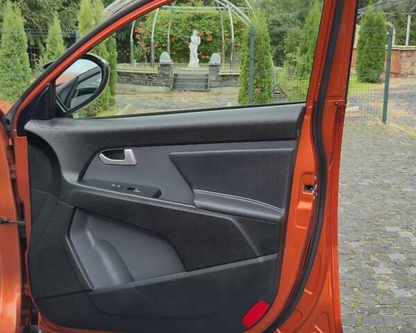 Оранжевый Киа Sportage, объемом двигателя 1.6 л и пробегом 220 тыс. км за 11200 $, фото 35 на Automoto.ua