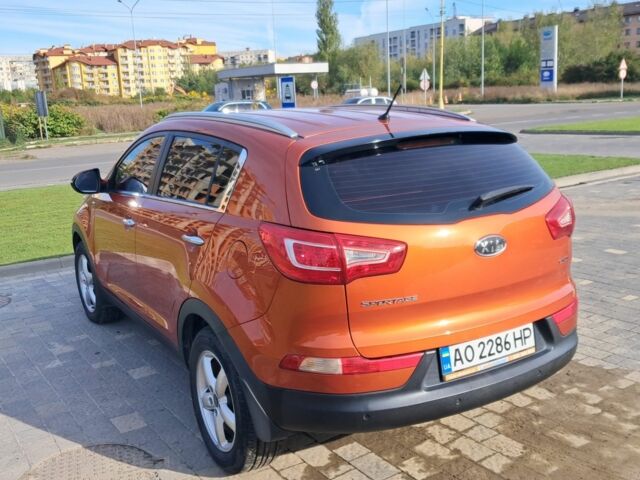 Оранжевый Киа Sportage, объемом двигателя 2 л и пробегом 217 тыс. км за 11500 $, фото 1 на Automoto.ua