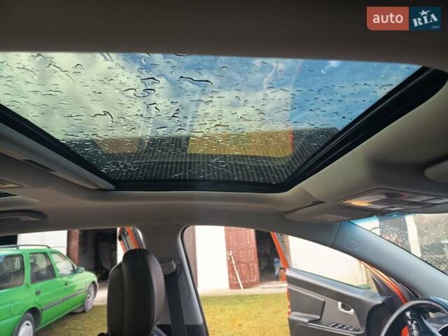 Оранжевый Киа Sportage, объемом двигателя 2.01 л и пробегом 267 тыс. км за 12900 $, фото 3 на Automoto.ua