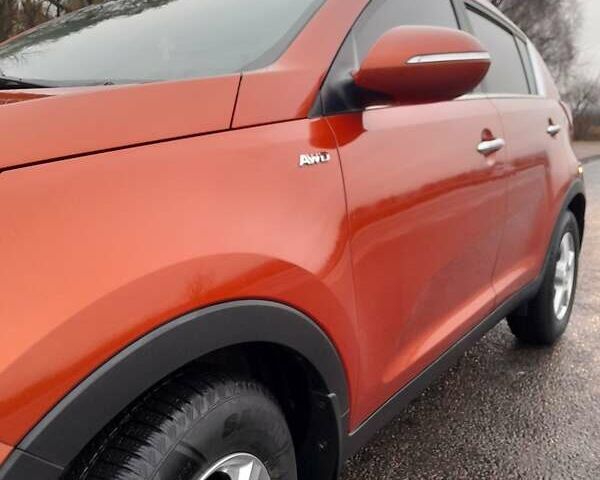 Помаранчевий Кіа Sportage, об'ємом двигуна 2 л та пробігом 218 тис. км за 12700 $, фото 15 на Automoto.ua