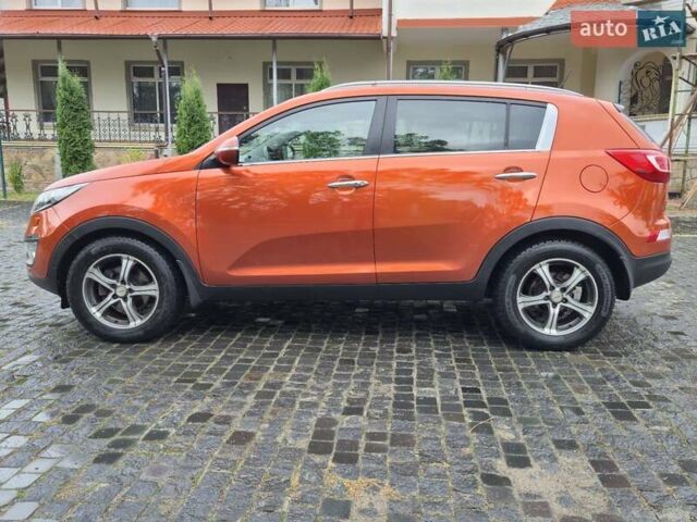 Оранжевый Киа Sportage, объемом двигателя 1.6 л и пробегом 220 тыс. км за 11200 $, фото 20 на Automoto.ua