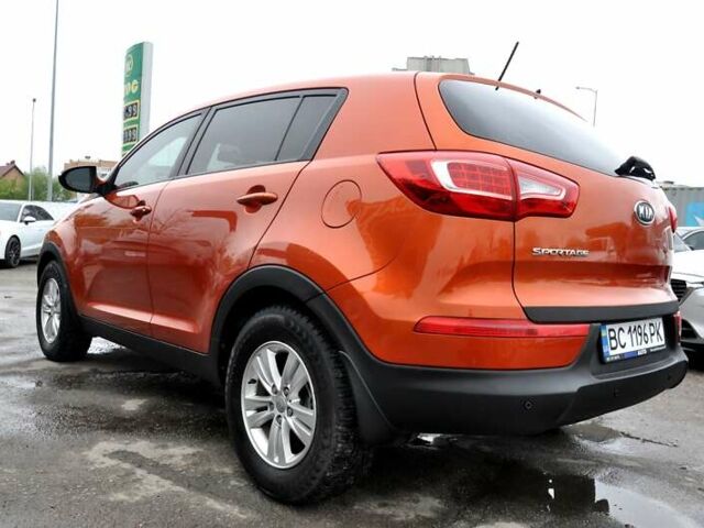 Помаранчевий Кіа Sportage, об'ємом двигуна 2.36 л та пробігом 230 тис. км за 10900 $, фото 11 на Automoto.ua