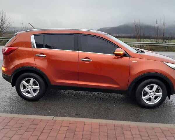 Помаранчевий Кіа Sportage, об'ємом двигуна 2 л та пробігом 218 тис. км за 12700 $, фото 11 на Automoto.ua
