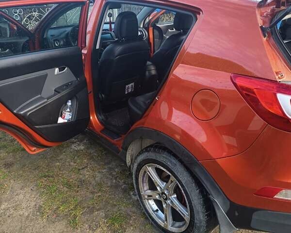 Оранжевый Киа Sportage, объемом двигателя 2.01 л и пробегом 267 тыс. км за 12900 $, фото 23 на Automoto.ua