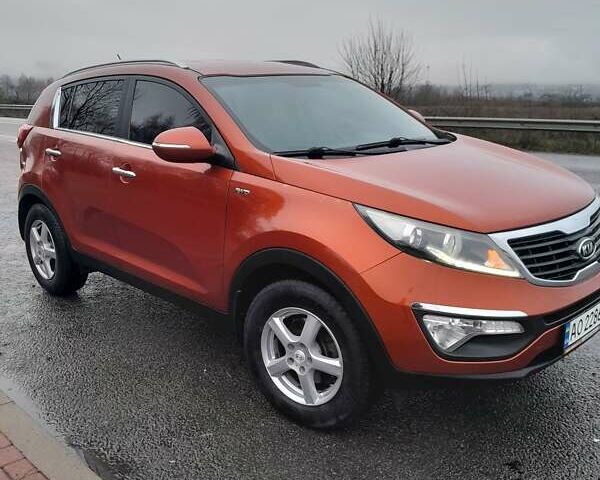 Помаранчевий Кіа Sportage, об'ємом двигуна 2 л та пробігом 218 тис. км за 12700 $, фото 17 на Automoto.ua