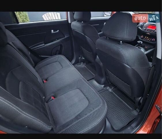 Оранжевый Киа Sportage, объемом двигателя 2 л и пробегом 197 тыс. км за 12000 $, фото 13 на Automoto.ua