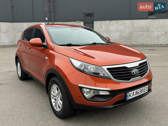 Оранжевый Киа Sportage, объемом двигателя 2 л и пробегом 143 тыс. км за 12300 $, фото 2 на Automoto.ua