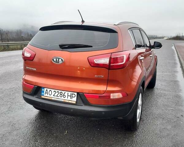 Помаранчевий Кіа Sportage, об'ємом двигуна 2 л та пробігом 218 тис. км за 12700 $, фото 1 на Automoto.ua