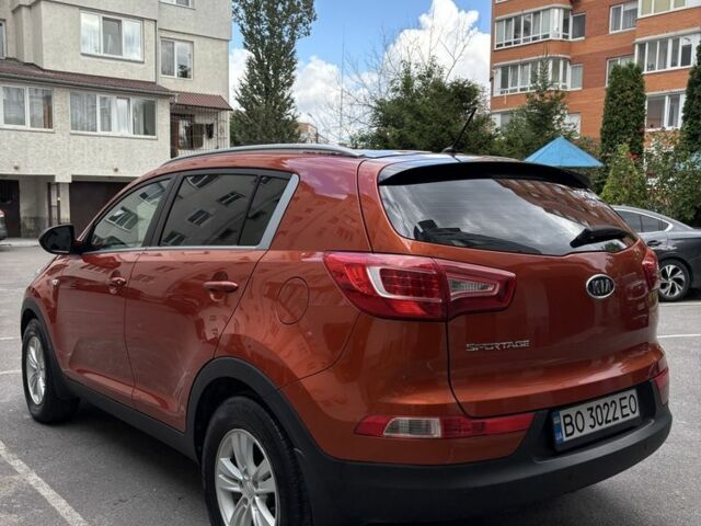 Оранжевый Киа Sportage, объемом двигателя 2 л и пробегом 197 тыс. км за 12000 $, фото 4 на Automoto.ua