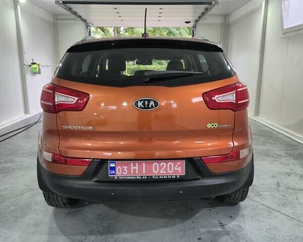 Оранжевый Киа Sportage, объемом двигателя 1.6 л и пробегом 220 тыс. км за 11200 $, фото 6 на Automoto.ua