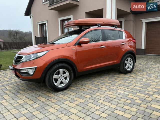 Оранжевый Киа Sportage, объемом двигателя 2 л и пробегом 195 тыс. км за 13850 $, фото 1 на Automoto.ua