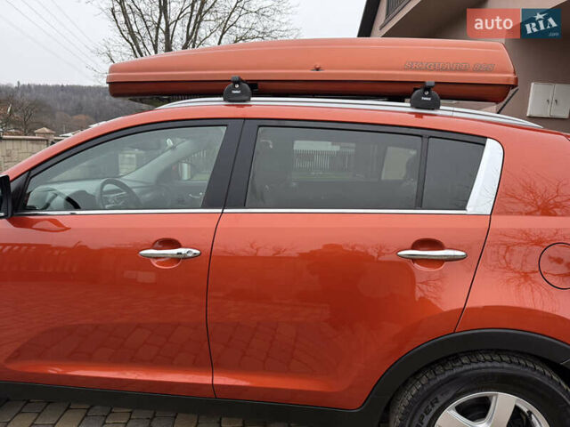 Оранжевый Киа Sportage, объемом двигателя 2 л и пробегом 195 тыс. км за 13850 $, фото 37 на Automoto.ua