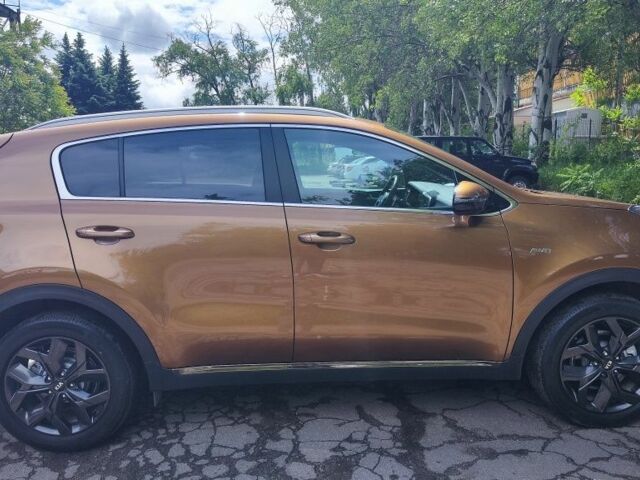 Помаранчевий Кіа Sportage, об'ємом двигуна 0.24 л та пробігом 80 тис. км за 23800 $, фото 3 на Automoto.ua