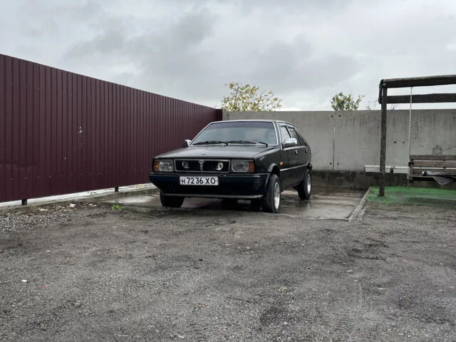 Коричневый Лянча Дельта, объемом двигателя 1.3 л и пробегом 290 тыс. км за 600 $, фото 2 на Automoto.ua