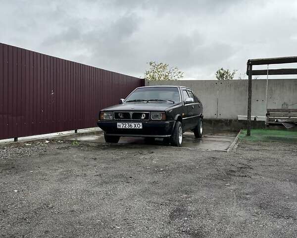 Коричневый Лянча Дельта, объемом двигателя 1.3 л и пробегом 290 тыс. км за 600 $, фото 7 на Automoto.ua