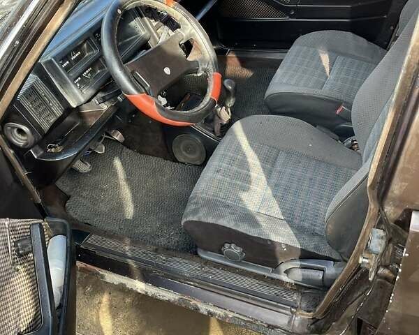 Коричневый Лянча Дельта, объемом двигателя 1.3 л и пробегом 290 тыс. км за 600 $, фото 4 на Automoto.ua